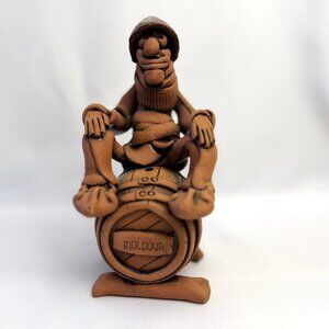Moldova Scutelnic Folk Art Figurine 6.5" Clay Man on Barrel Vintage Figurine